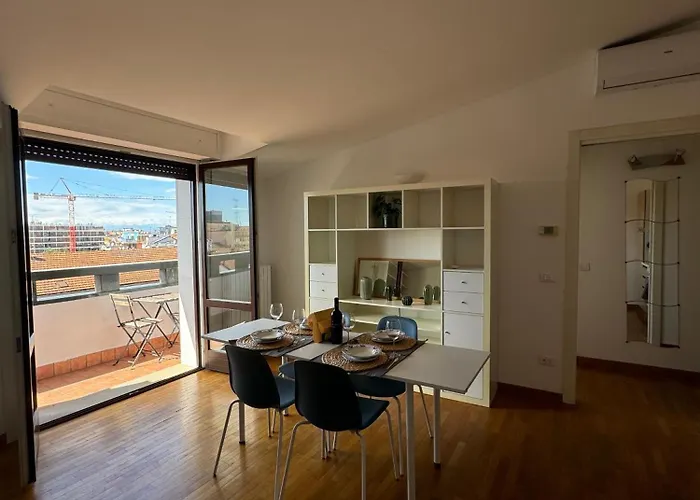 Appartamento Isola- Attico con Balcone